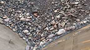 Barge unloads 4300 tons of cobblestone - Relaxing video of smooth flowing water